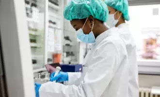 scientist examining in laboratory