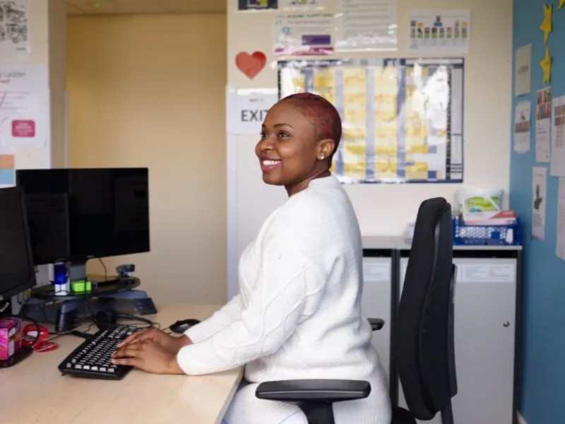 person working on desktop computer