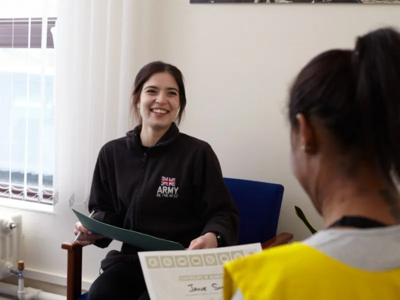 woman holding infographic