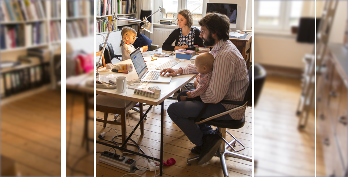 Family working at home at table