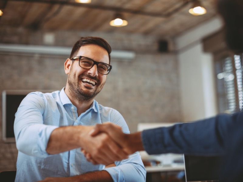 employee making hand shaking