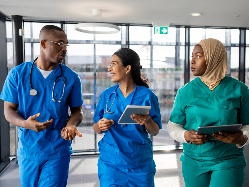 Healthcare Medical Workers Walking through the Corridor
