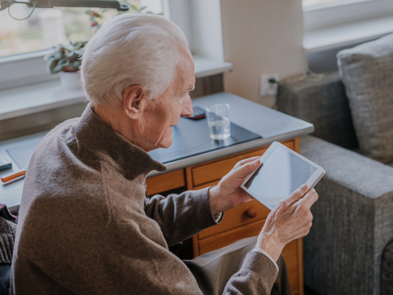 Older person with tech