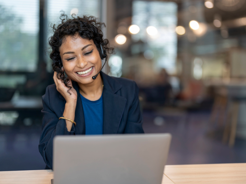 Woman at call center desktop