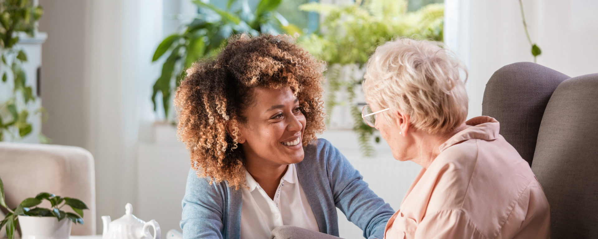 friendly-nurse-supporting-an-eldery-lady