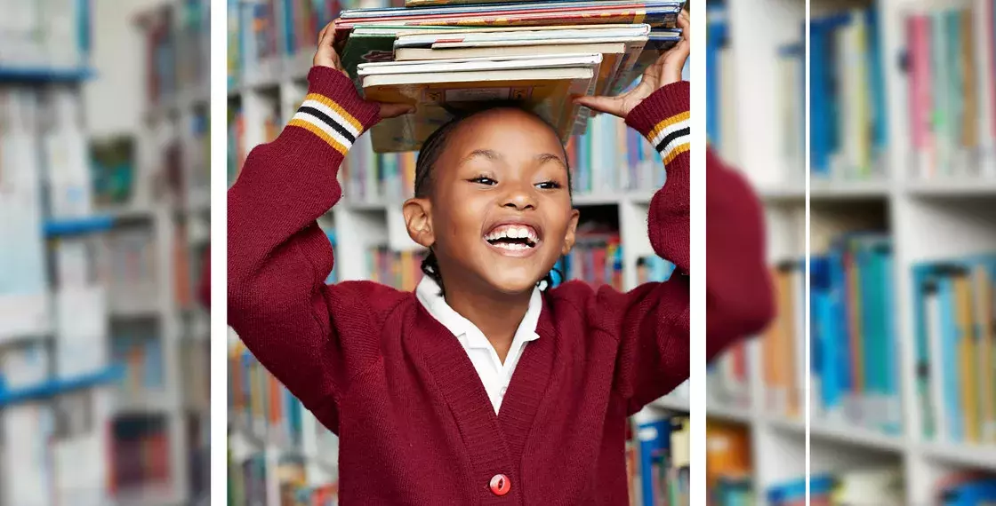 School pupil in library