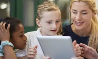 School children using tech