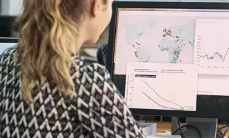 Female employee looking at data and stats
