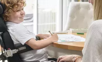 Young boy in wheelchair