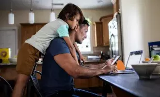 Financial and banking - Father & Son looking at screen 