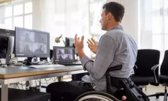 businessman with disability at desk 