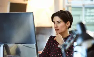 woman concentrating on computer