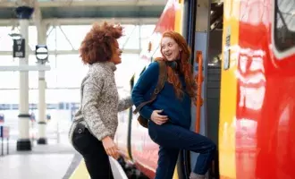 Travel-Two ladies getting on train