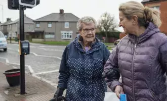 A mature woman out and about with her mother