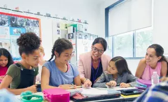 classroom with students GettyImages-1096105366-Embed