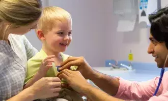 Doctor health check-up child with mother