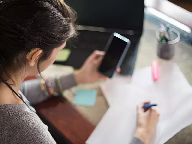 Digital inclusion - Girl using phone