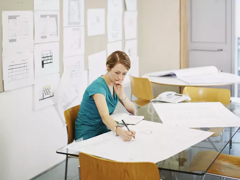Property asset services Person sitting at office desk