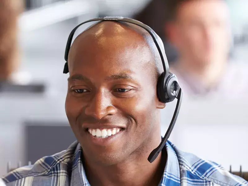 Capita careers Man wearing a call headset