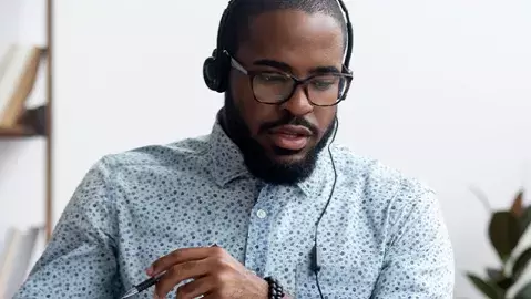 Capita complaints service Customer service rep with headset