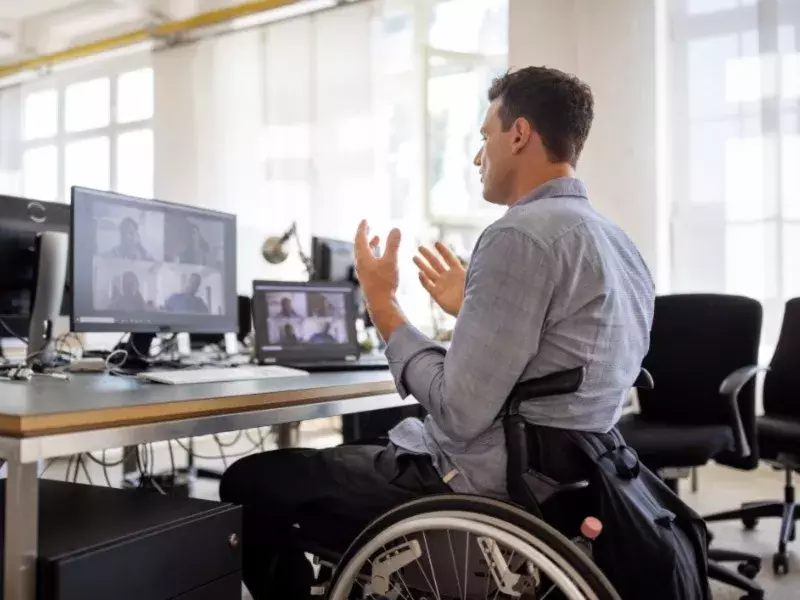 businessman with disability at desk