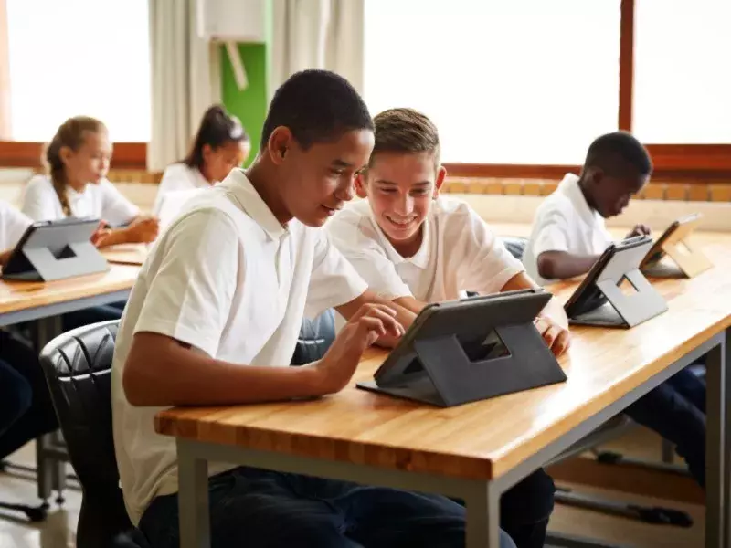 school children using tab