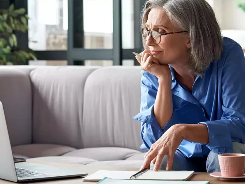 Pensions consulting services Businesswoman working on laptop