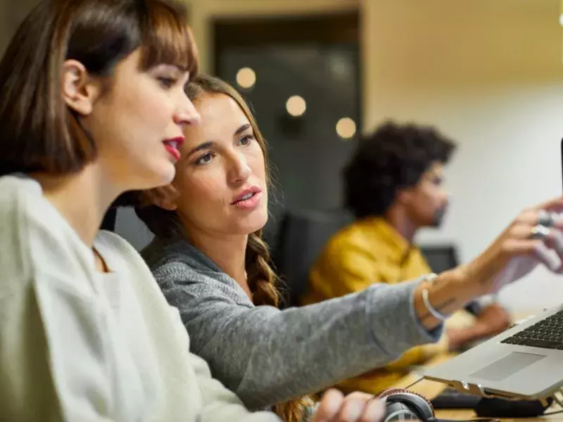 Productivity - girls looking at computer