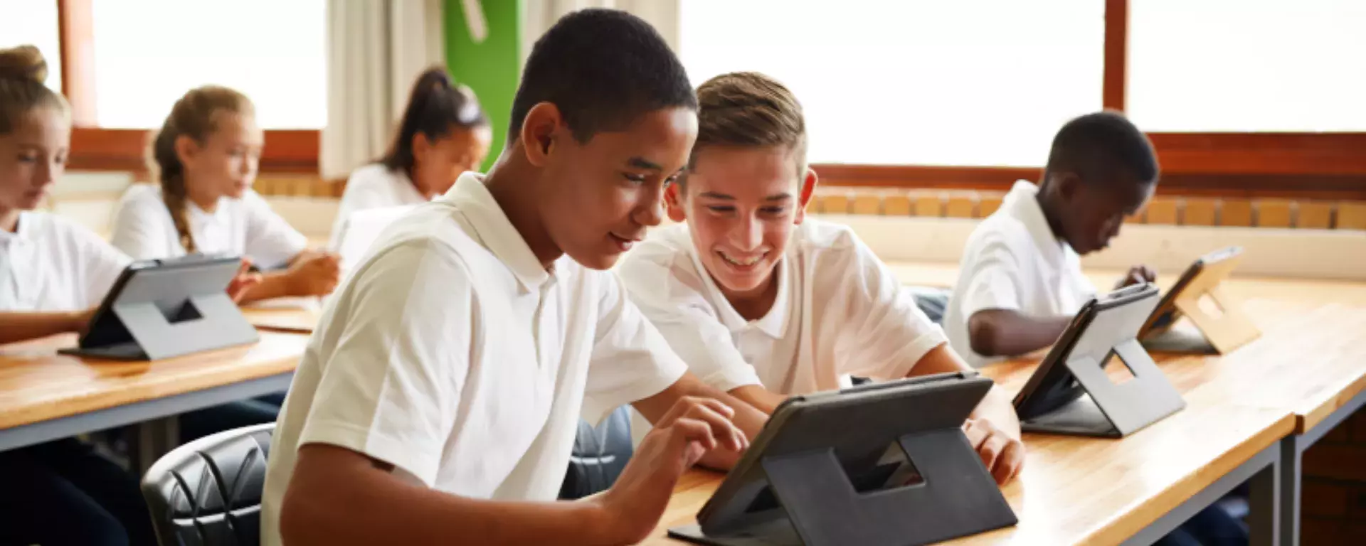 Education improvement Students using tablet in school classroom