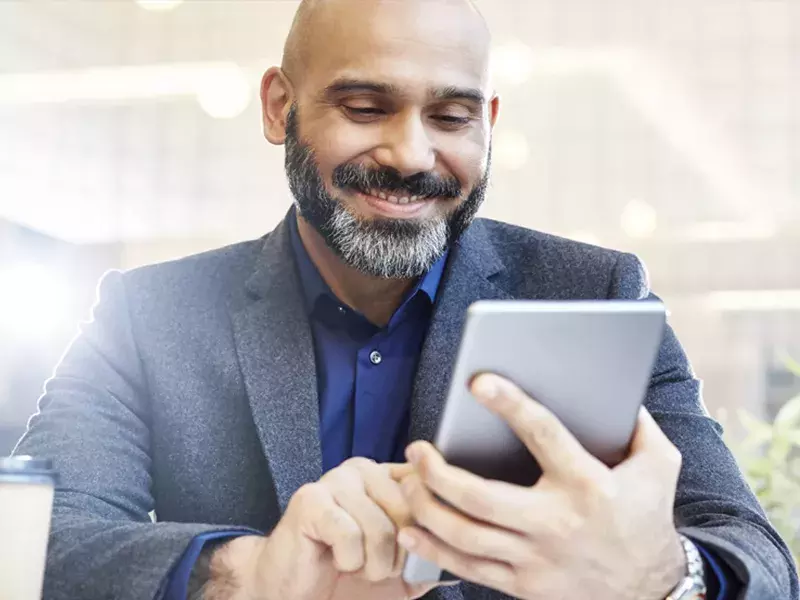 Business man on digital tablet